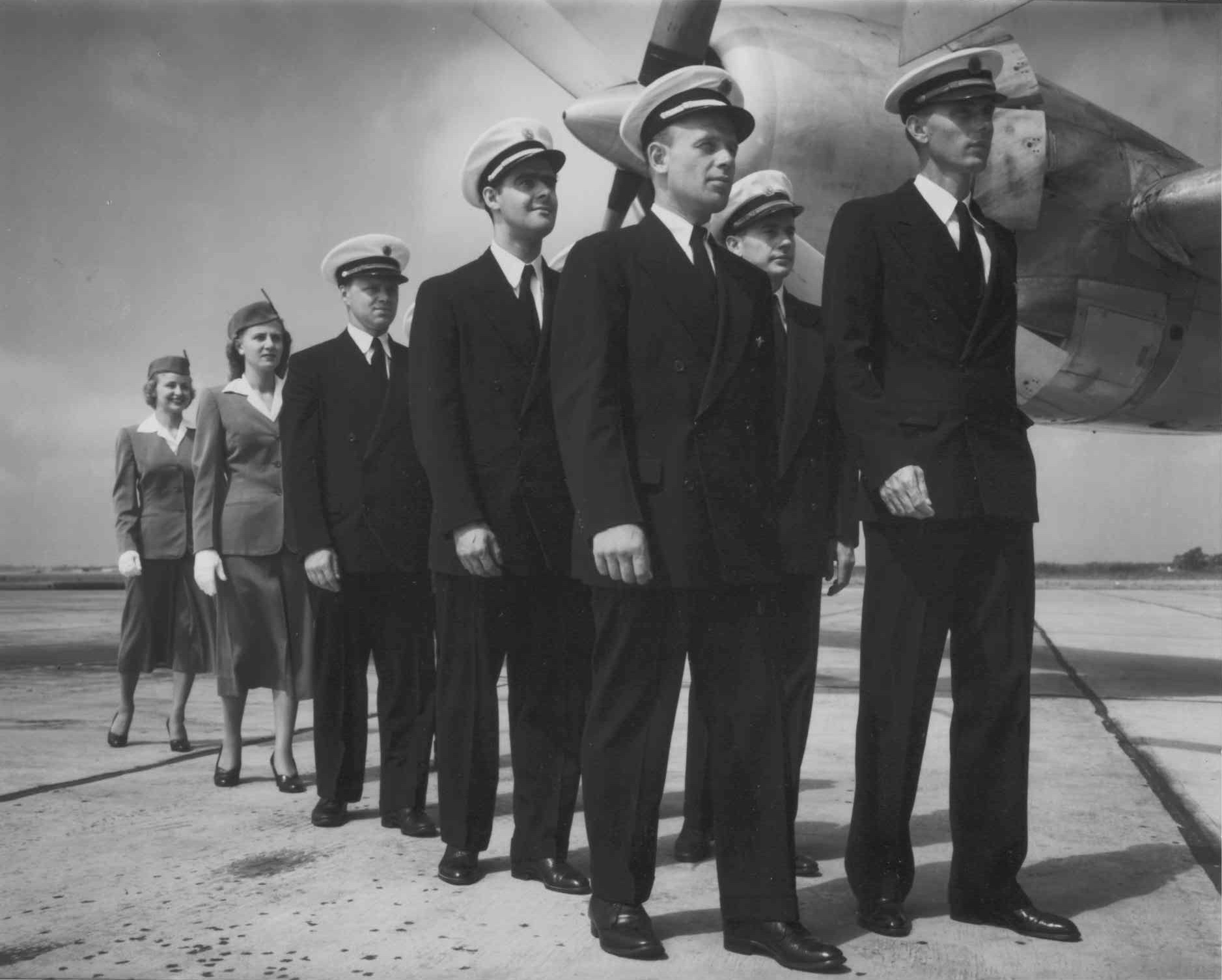 http://www.everythingpanam.com/images/1950s%20Crew%20in%20formation%20B377%20wing.jpg