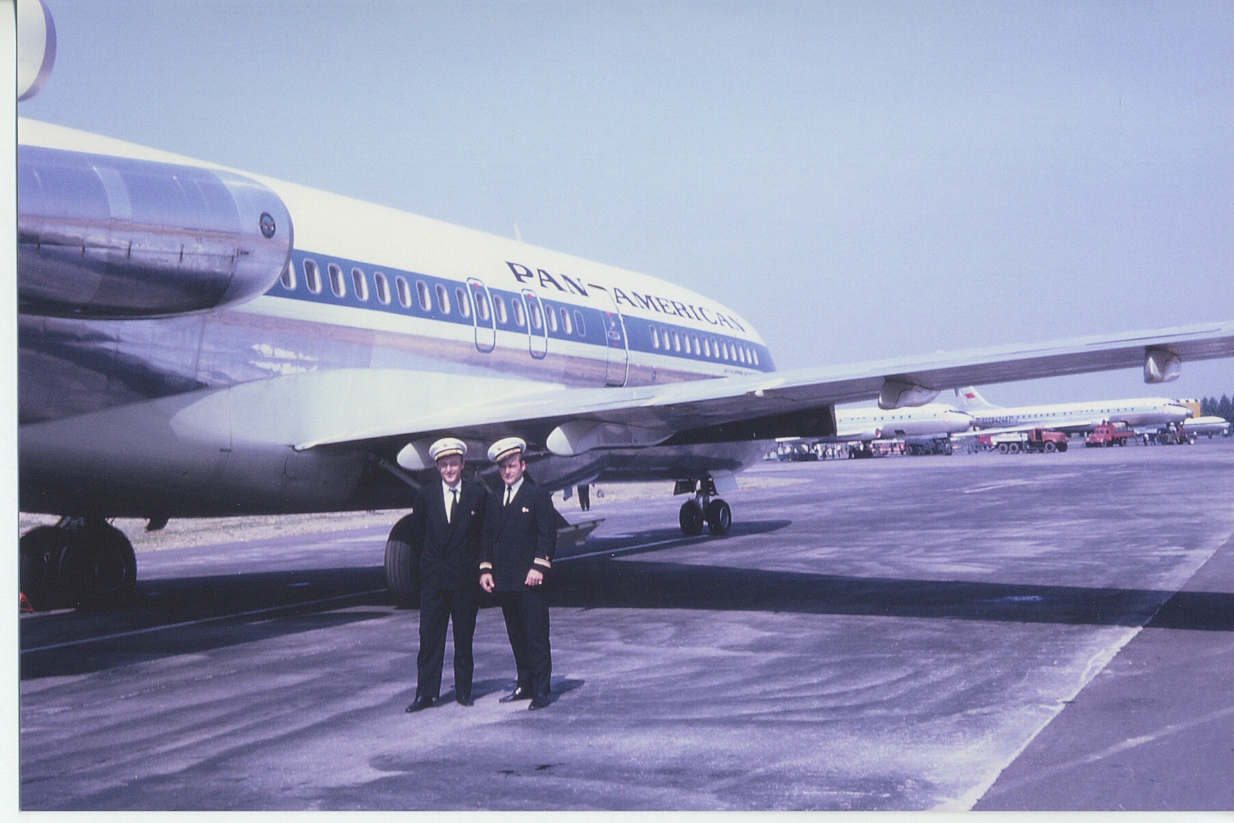 1966, July, Ray LeDour posing by a Pan Am 727-100 aircraft in Moscow.  Ray and the crew were in Moscow as part of an advance team preparing for regular Pan Am service to the Russian City that would start in July of 1968.